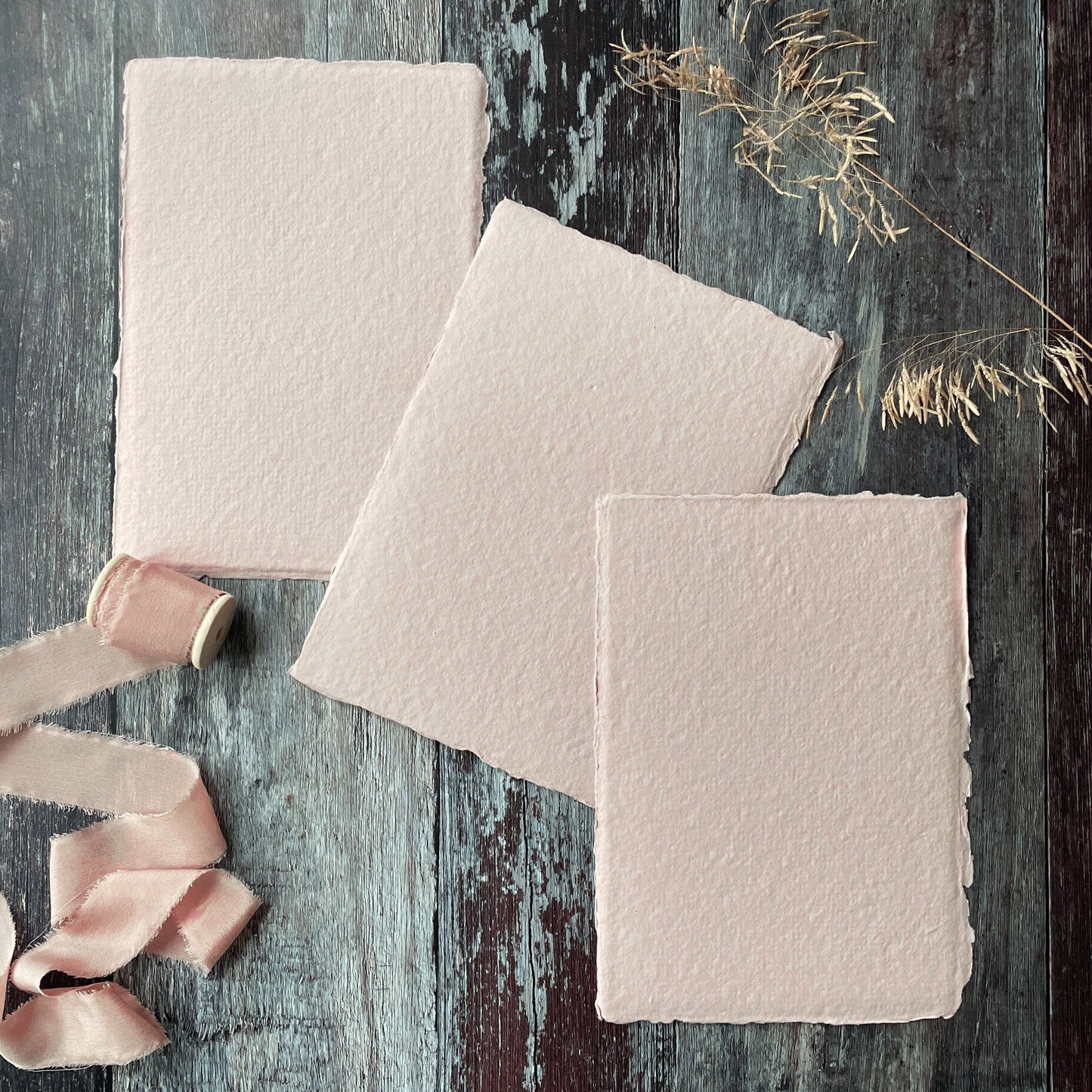 A5 sheets of handmade cotton rag paper and card with a deckled edge.  Premium quality watercolour paper made from recycled cotton rag fibres.  Vegan paper in blush pink.  Perfect for Invitations.