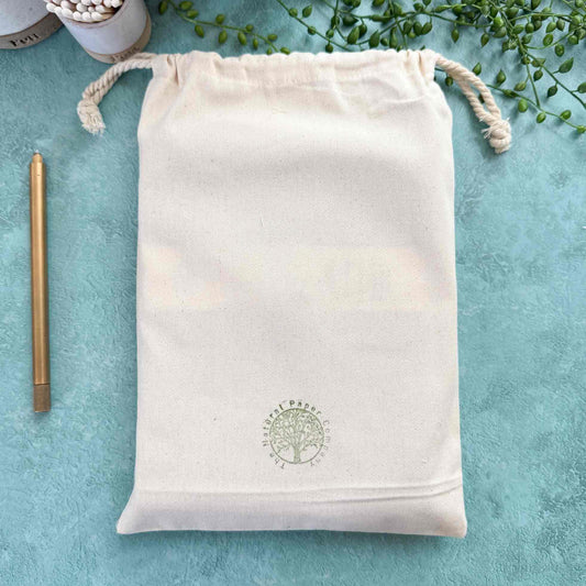 Handmade leather notebooks in branded gift bags