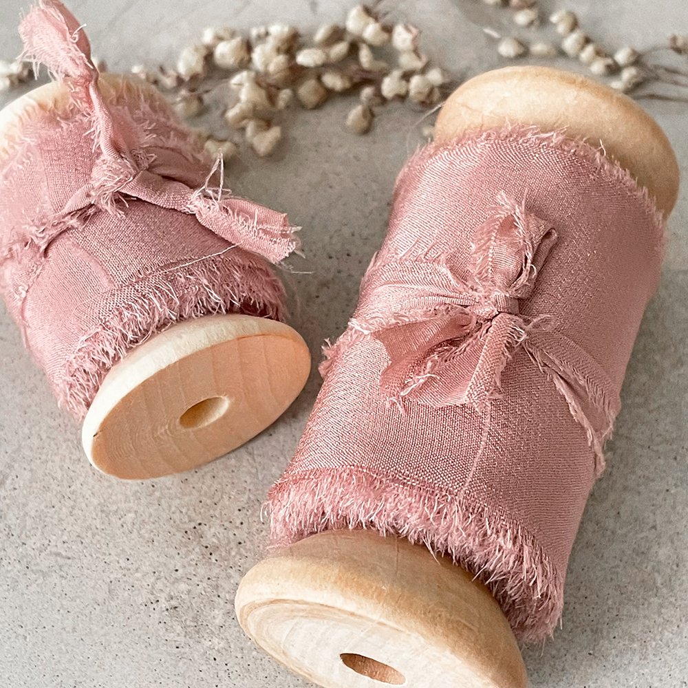 Blush Pink Silk Ribbon for crafts. Fine habotai silk ribbon with a frayed edge. Sold on a wooden reel. 2 widths available. By The Natural Paper Company
