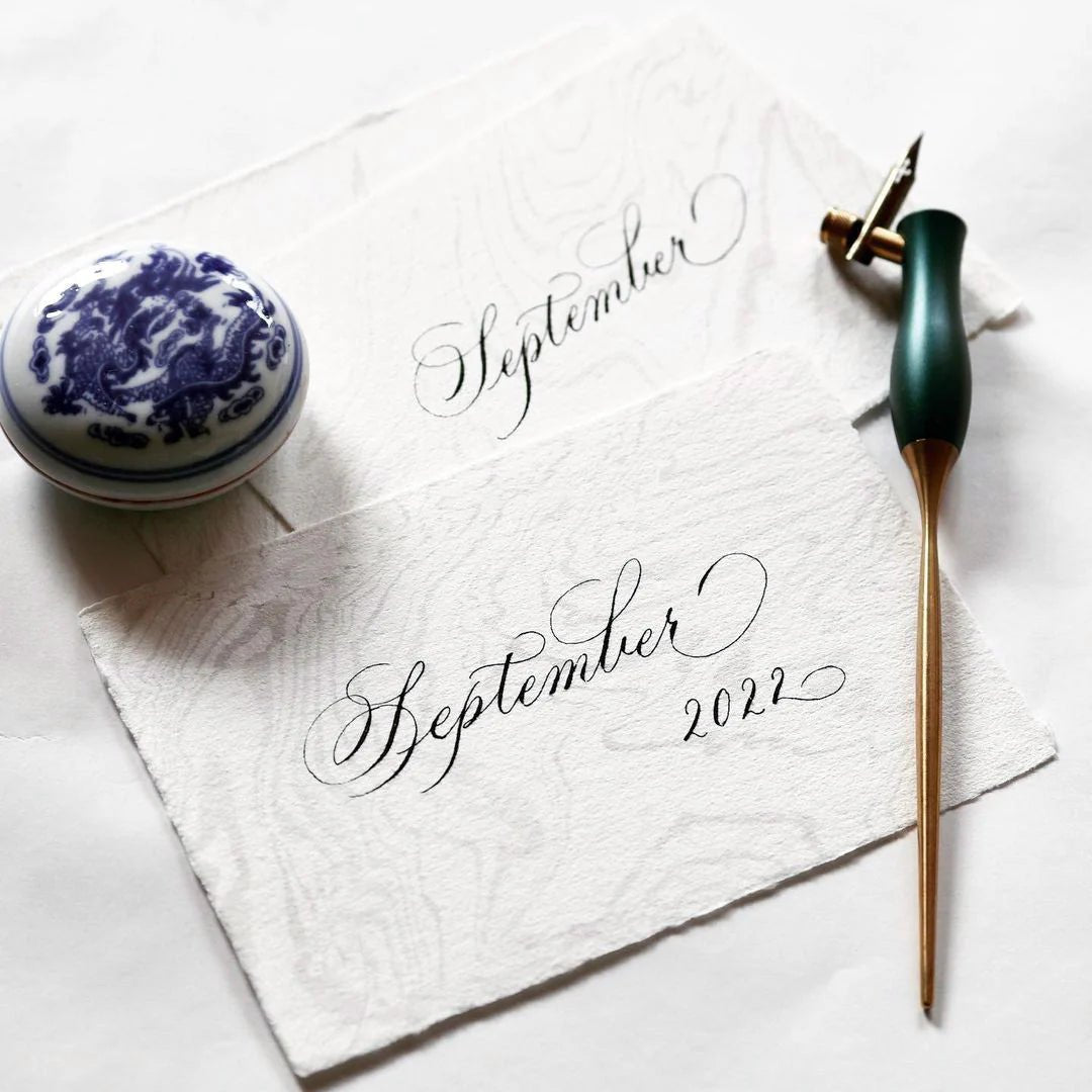 Calligraphy pen by Tom's Studio.  A forest green calligraphy pen with brass handle.