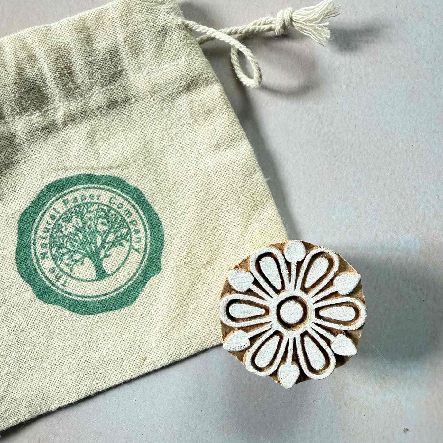 flower wooden stamp with branded gift bag