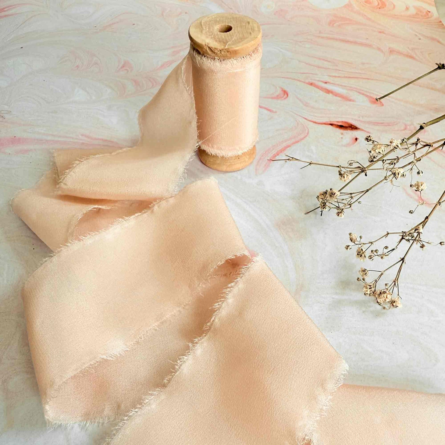 50mm wide slk ribbon in peach.  2 inch silk ribbon sold by the meter or on a wooden reel