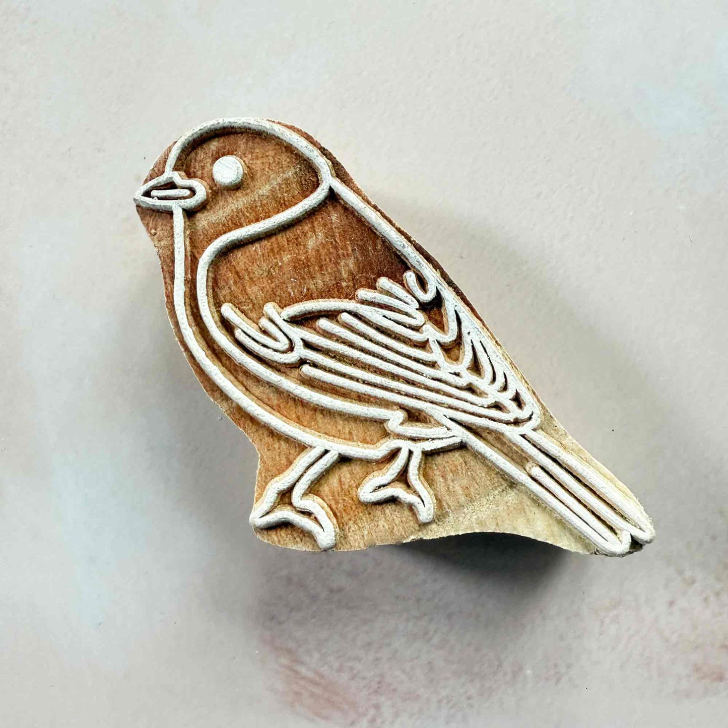 Bird design wood block stamp.