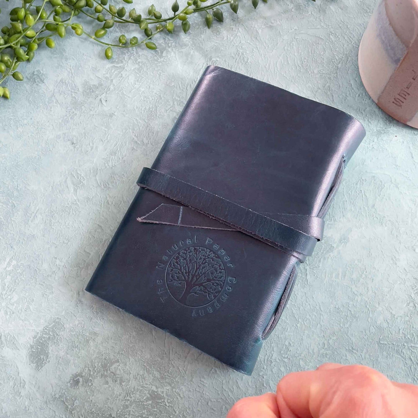 A6 leather note book in navy blue. Made by hand