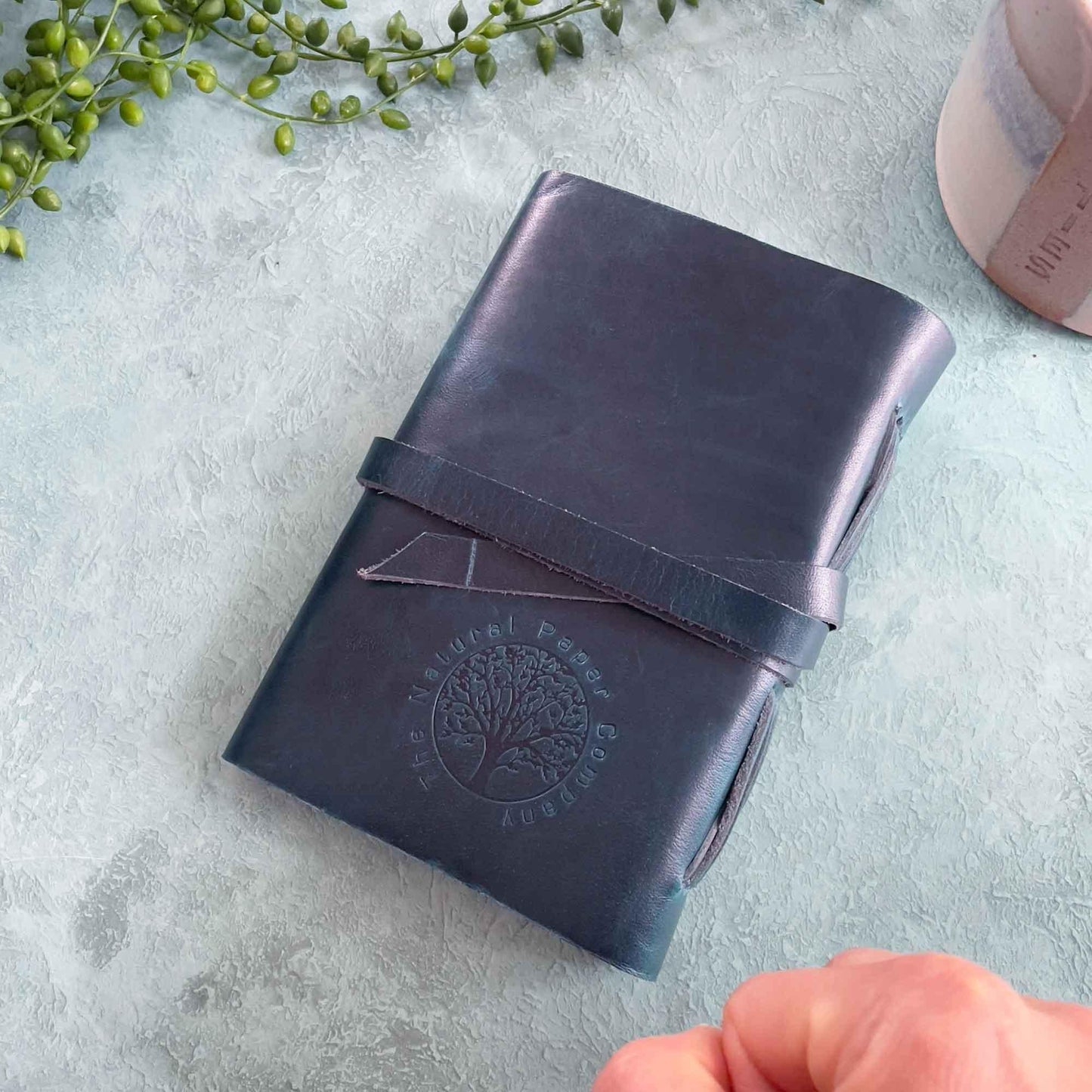 A6 leather note book in navy blue. Made by hand