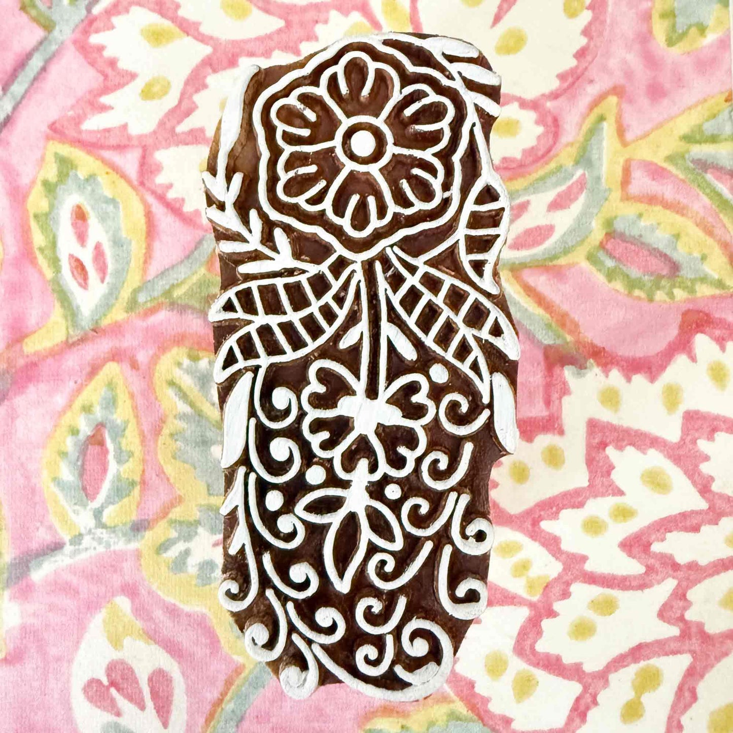 Decorative wooden stamp with floral design