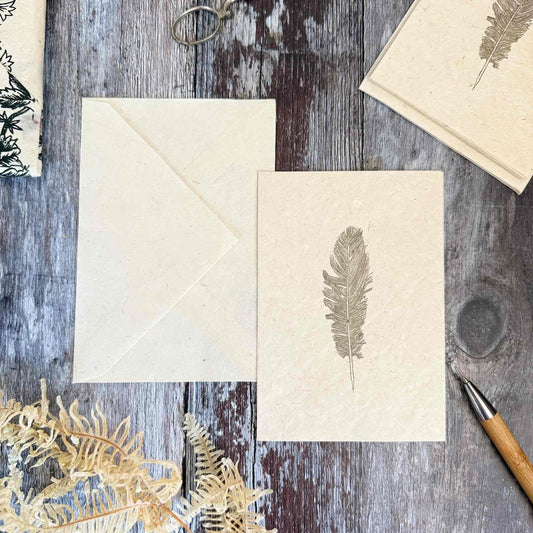 Handmade Lokta paper A6 notecard and envelope with hand screen printed feather Plume design