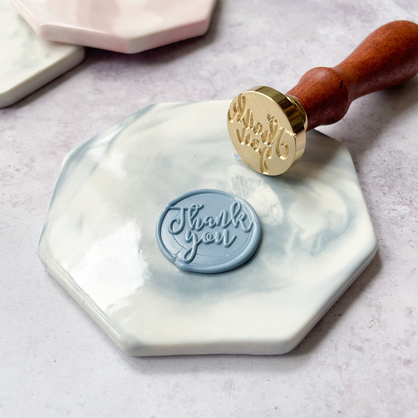 Wax stamp mat for making wax seals without mess. Ceramic hexagon shaped tile in blue and white marble pattern. by The Natural Paper Company