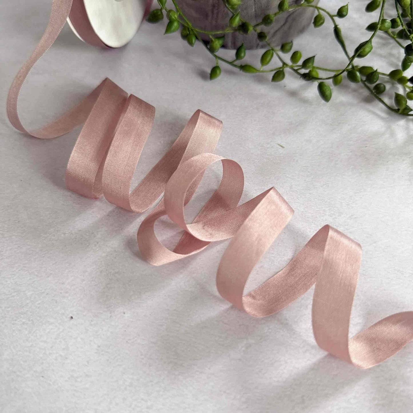 narrow silk ribbon in light dusky pink colour