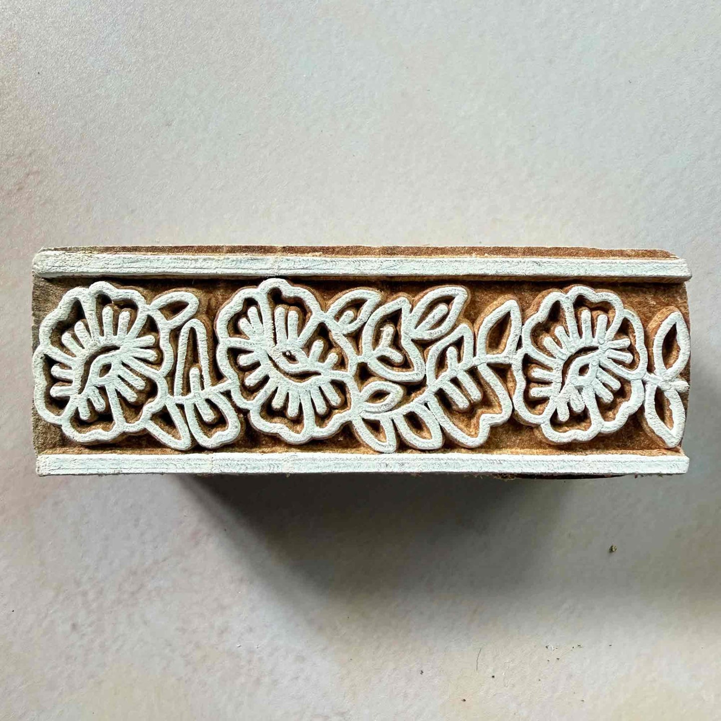 block printing stamp with flowery border pattern
