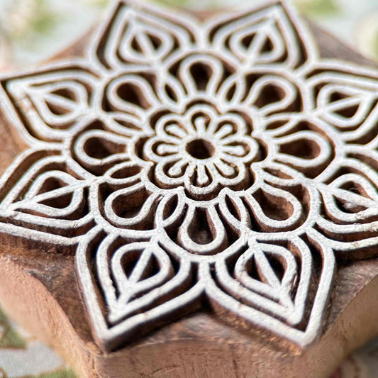 Wooden printing block with intricate geometric design