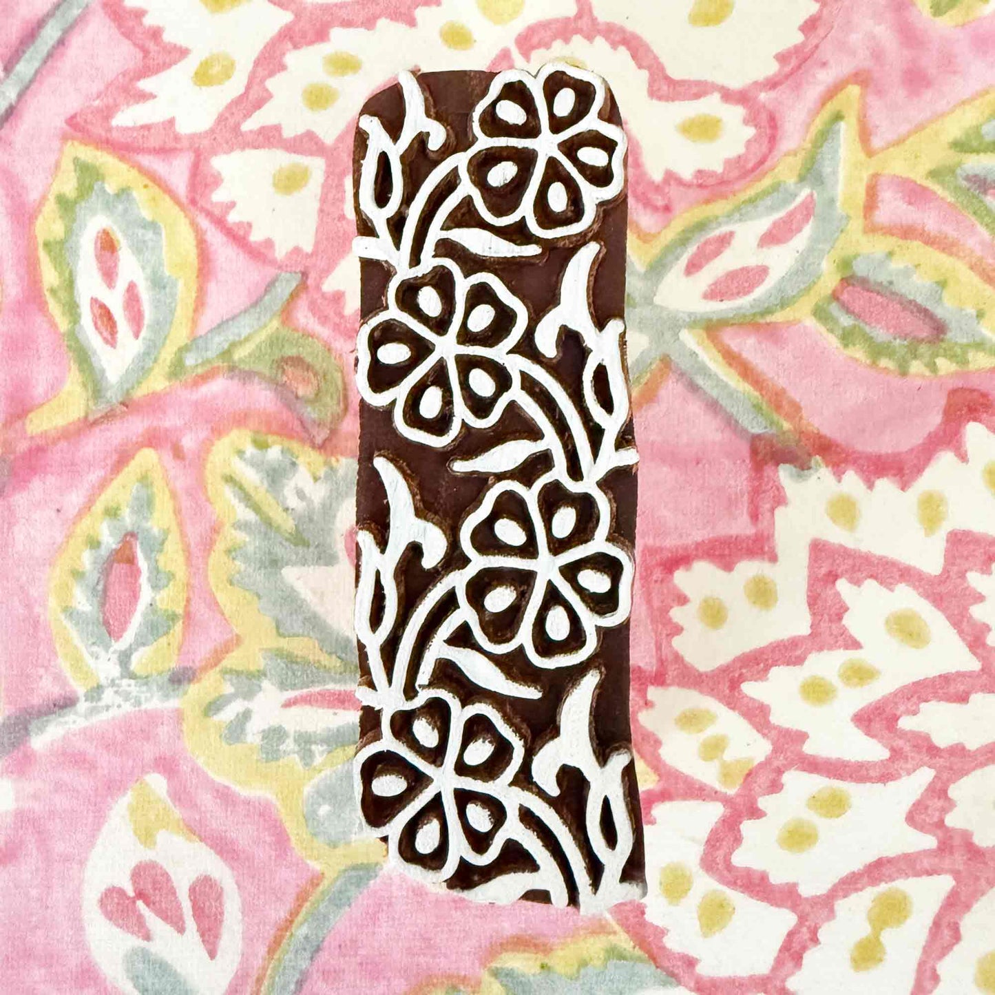 Decorative wooden stamp with floral pattern