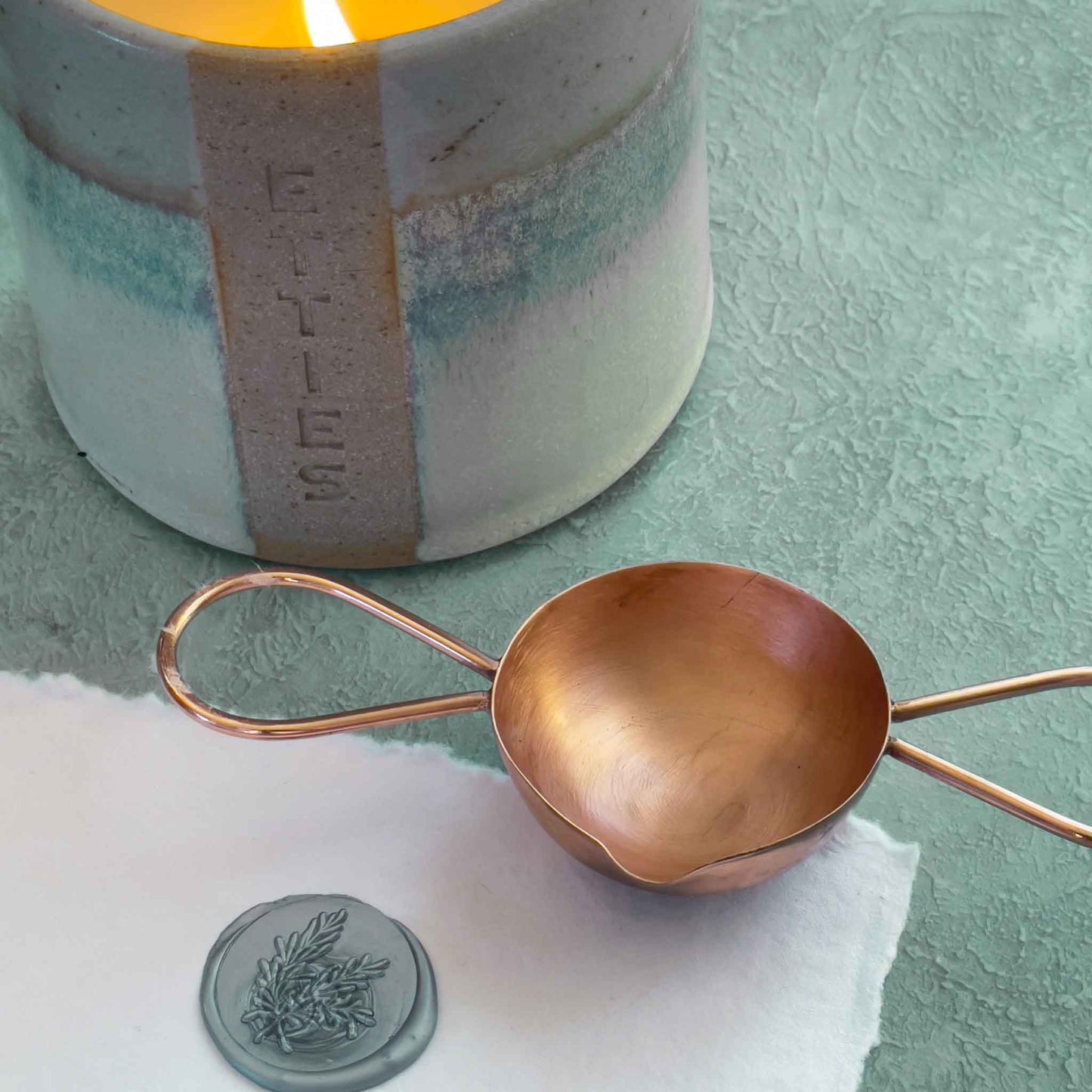 Double handle sealing wax spoon made from copper.