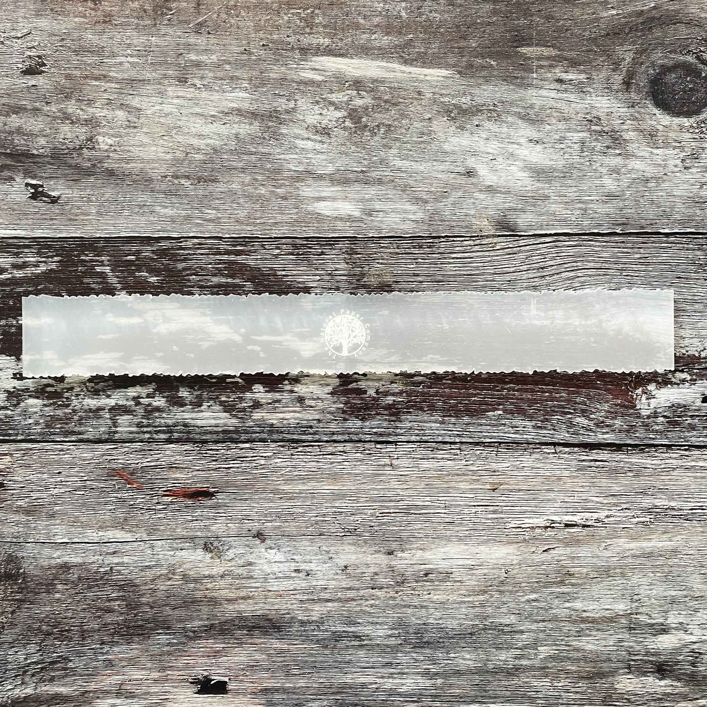 Deckle edged paper trimmer. Tool for cutting handmade paper and card. By The Natural Paper Company