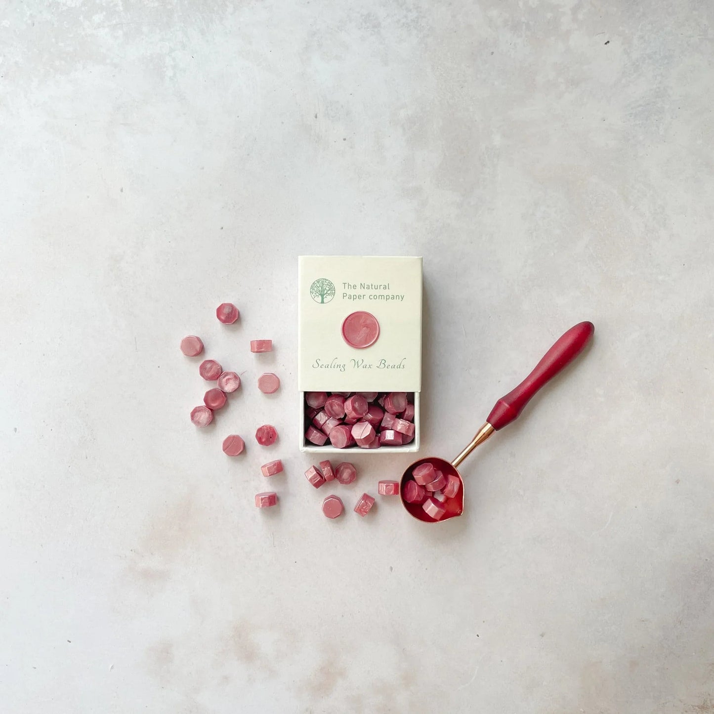 Dusky pink sealing wax beads to make wax seals. Box of eco friendly wax for wax stamping. By The Natural paper Company