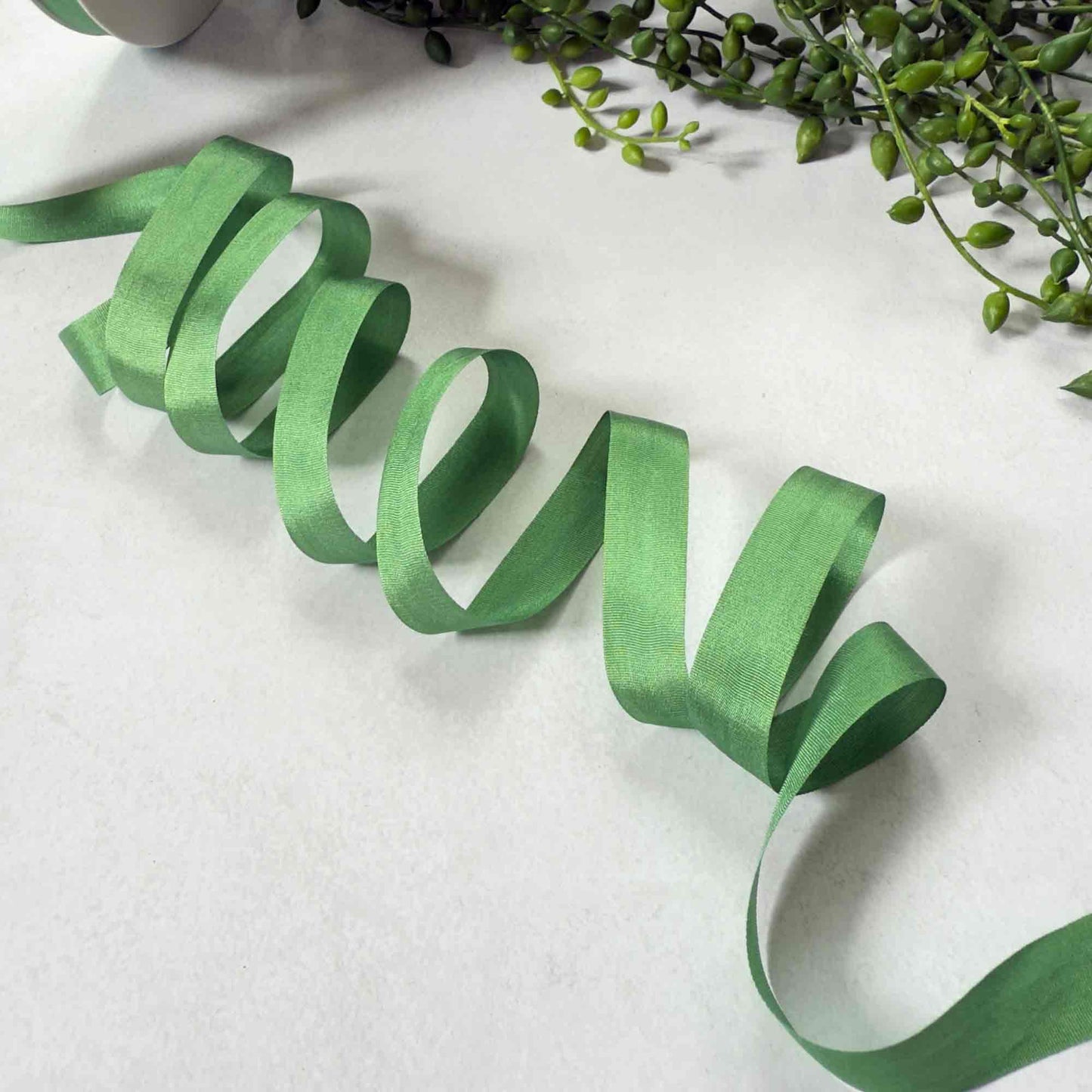 Narrow silk ribbon in Emerald Green