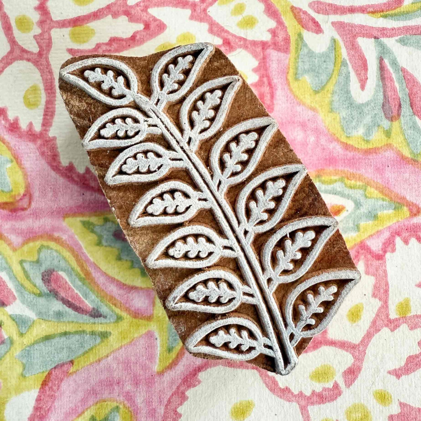 Wood block stamp with pretty leaf pattern.