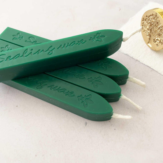 Forest Green sealing wax stick with a wick