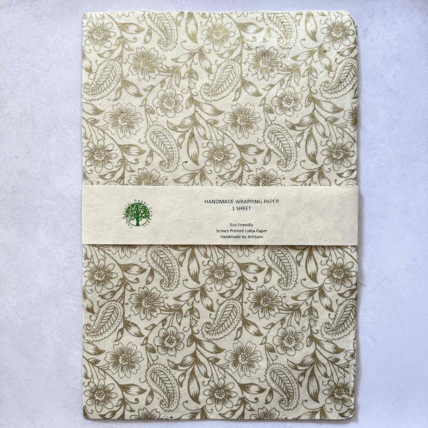 Handmade Lokta wrapping paper sheet — hand screen printed gold floral design, eco-friendly sustainable gift wrap