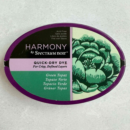 Harmony by Spectrum Noir quick-dry dye container with green topaz color on a white background