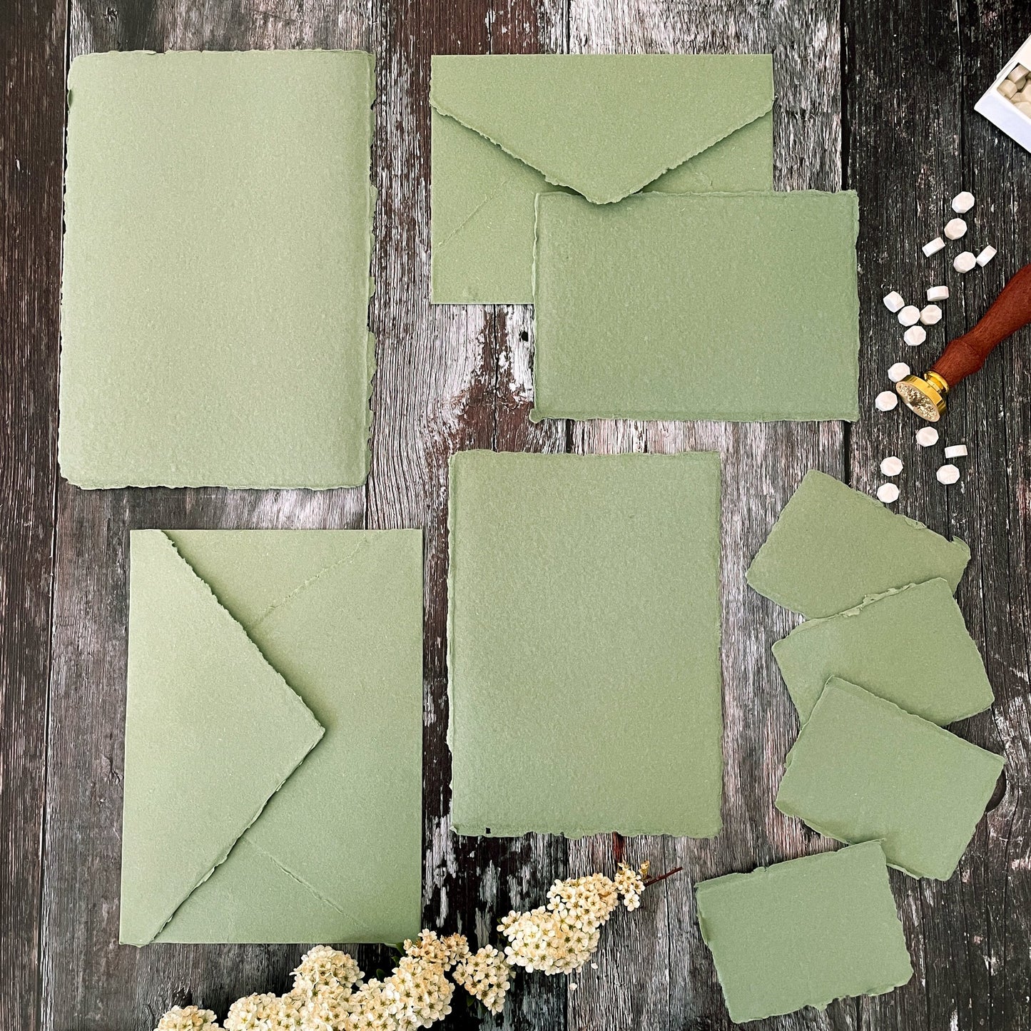 Sage green handmade paper, card and envelopes made from recycled cotton rag fibres. Various sizes available. By The Natural Paper Company