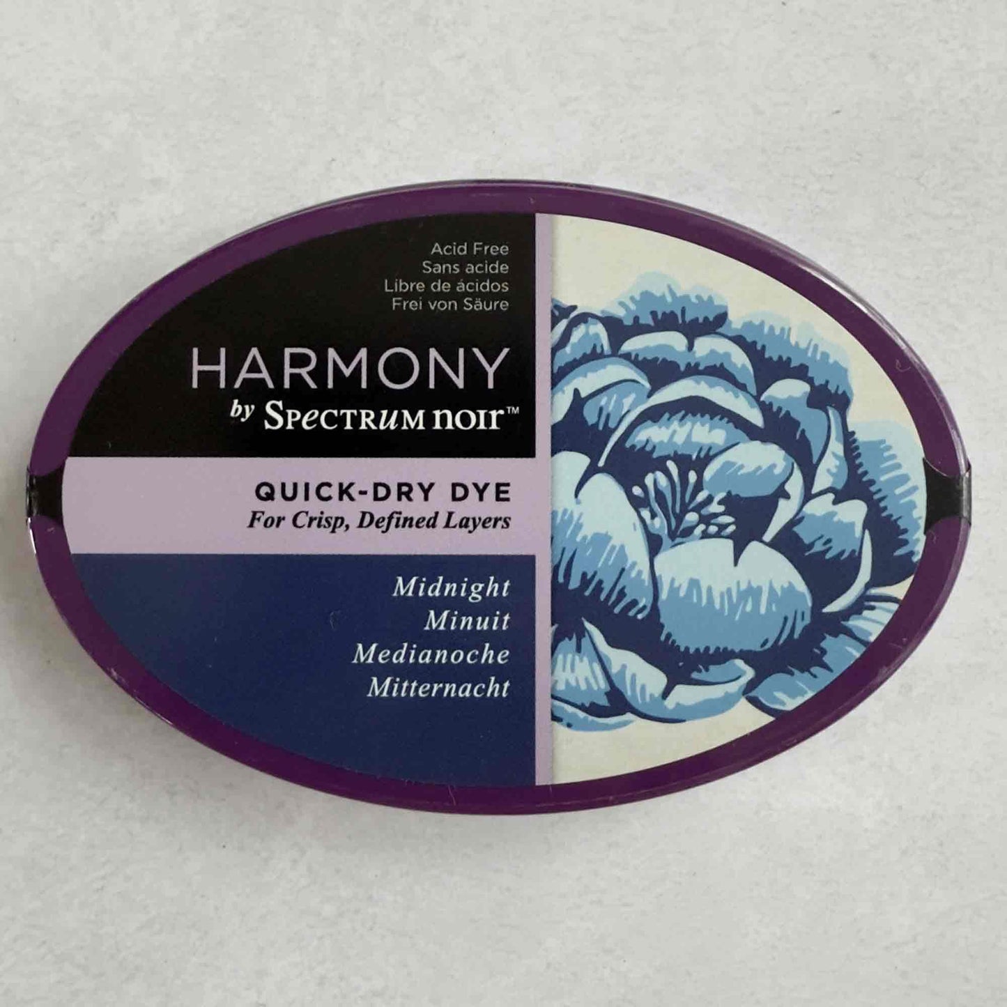 Harmony by Spectrum Noir quick-dry dye container with blue flower design on a gray background