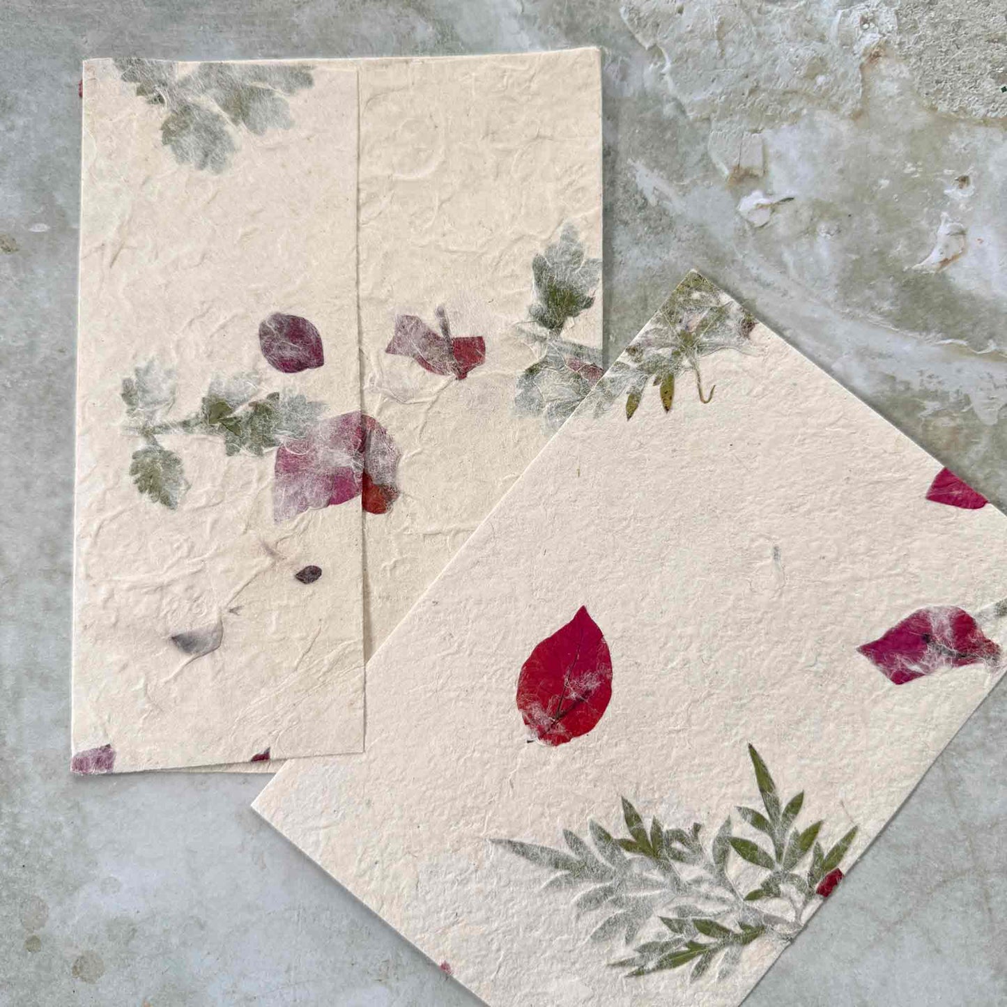 handmade paper envelope and card with flowers and petals