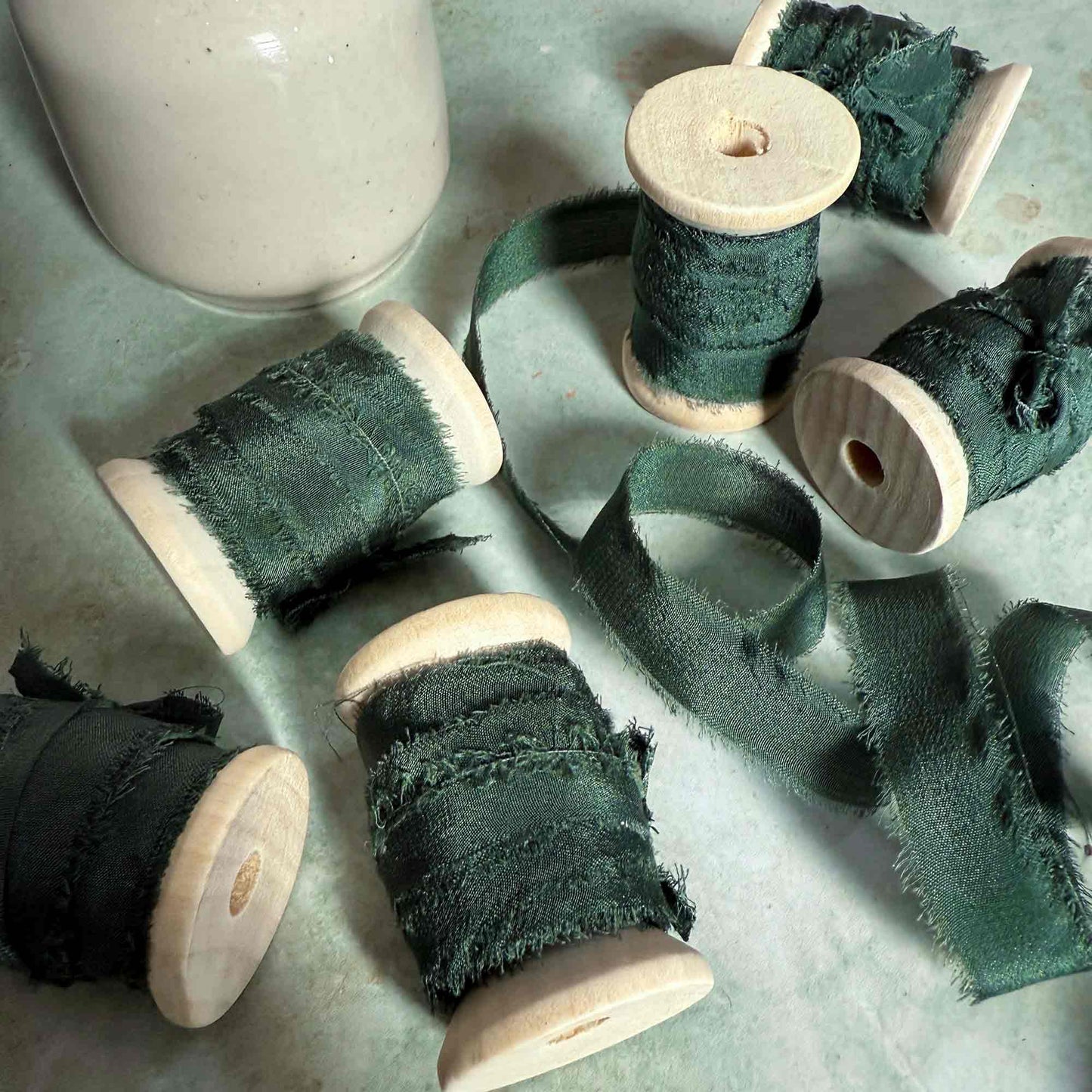 narrow silk ribbon in forest green