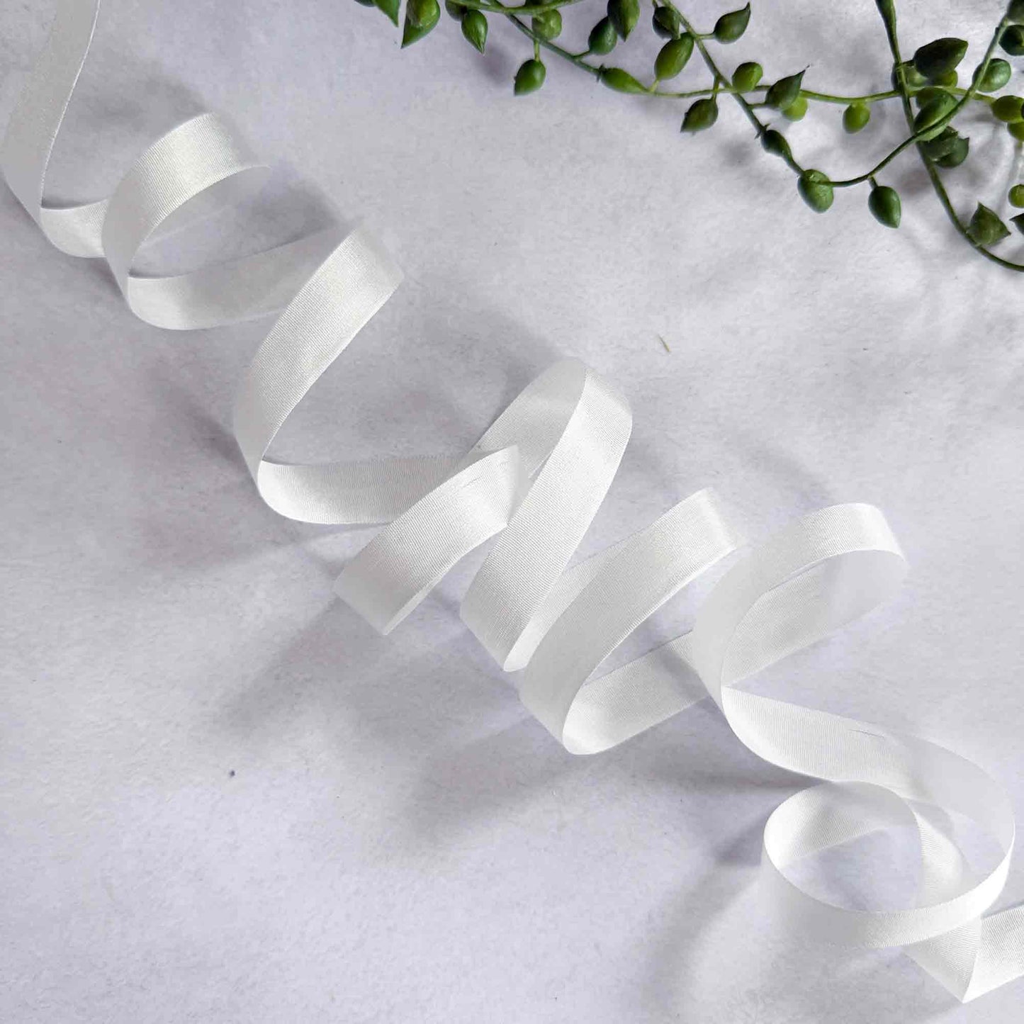 narrow silk ribbon in white