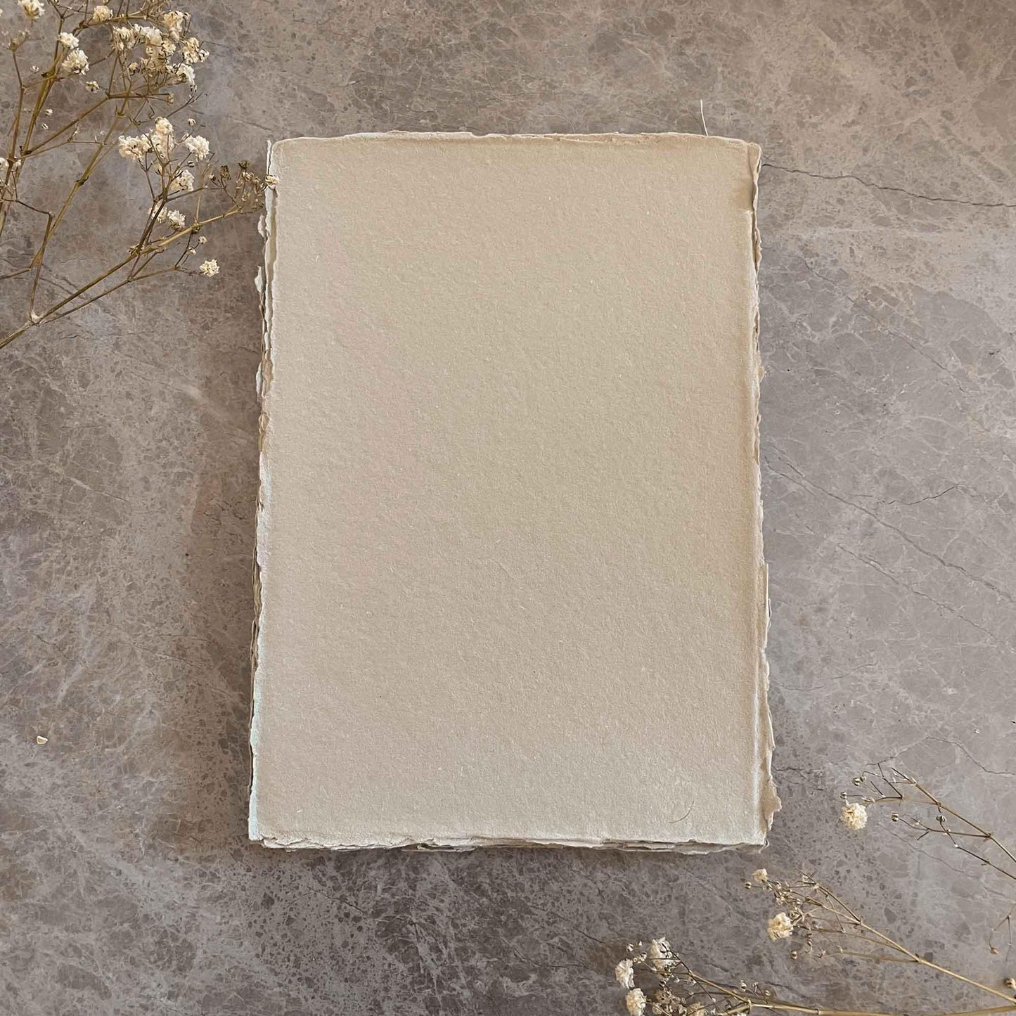 A4 sheets of natural handmade paper with deckled edges. By The Natural Paper Company