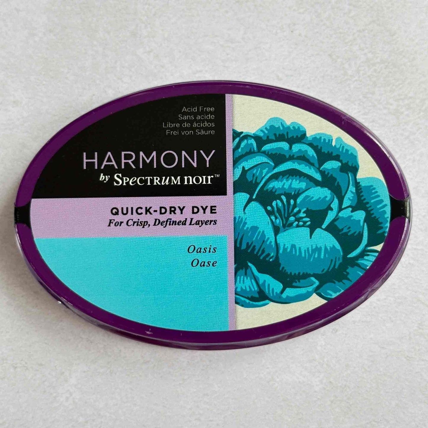 Harmony by Spectrum Noir quick-dry dye container with floral design on a white background