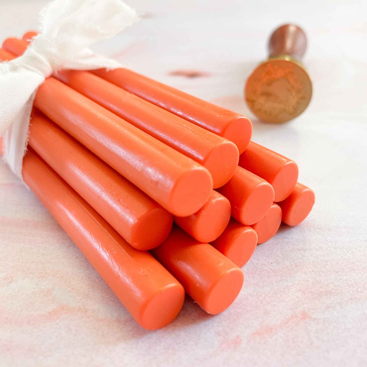 Orange Sealing Wax Sticks by The Natural Paper Company.