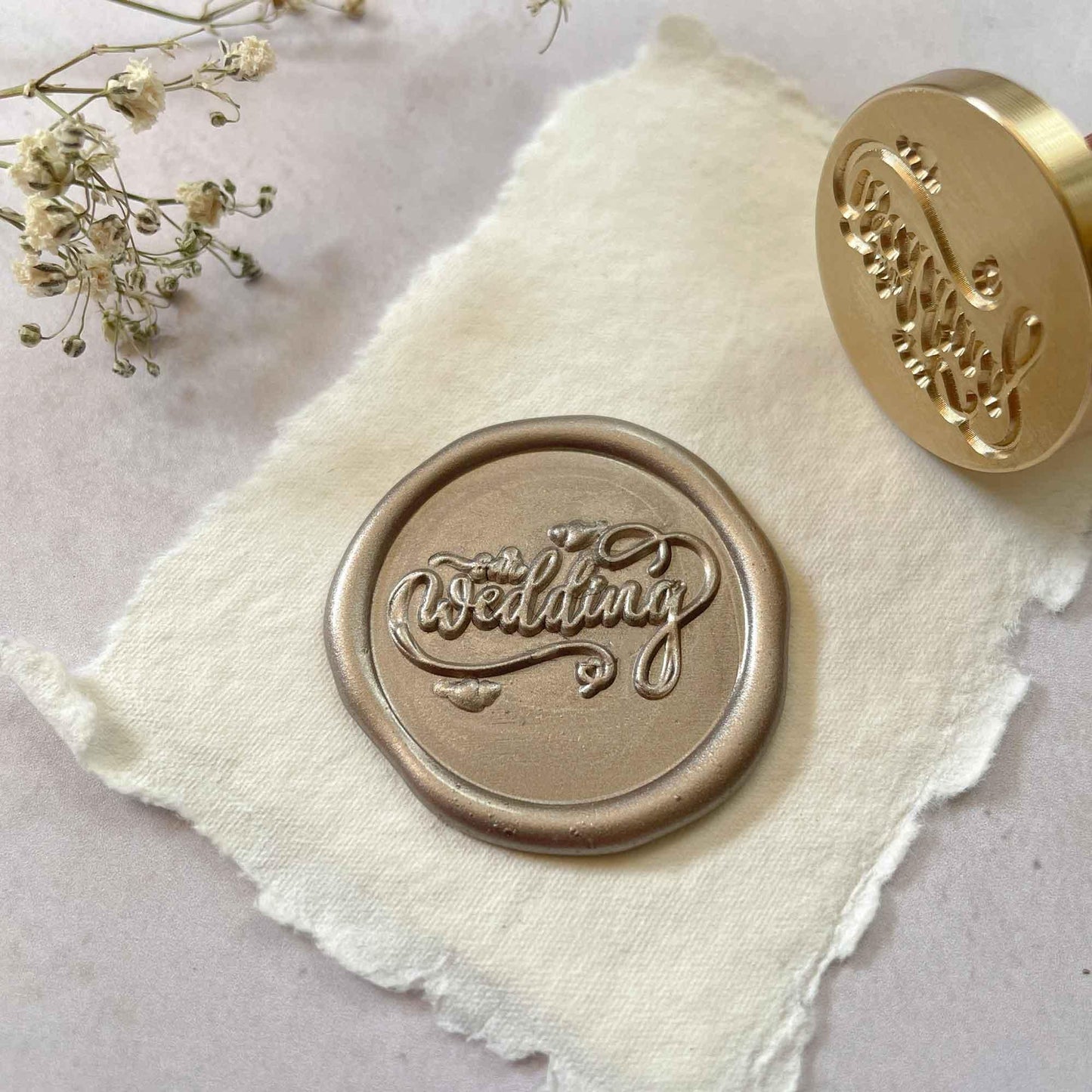 Our wedding sealing wax stamps. Make wax seals ti decorate wedding invitations and stationery. Calligraphy style stamp for wax. By The Natural paper Company