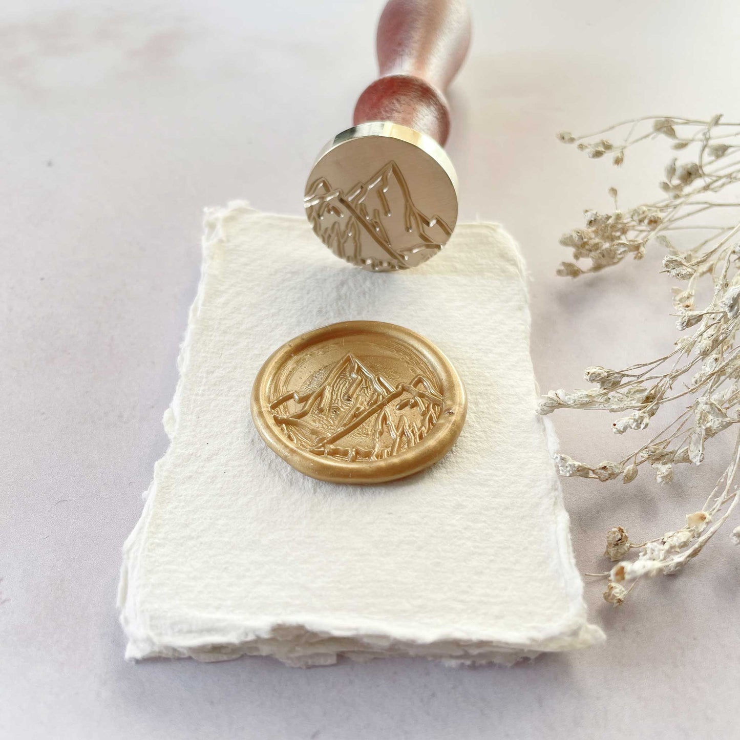 Mountain peak design wax seal. Sealing wax stamp with an image of the alps. By The Natural Paper Company