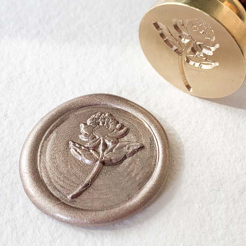 Peony flower design wax seal stamp for decorating invitations, envelopes and packaging. Pretty floral sealing wax stamp with a brass head and wooden handle. By The Natural Paper Company