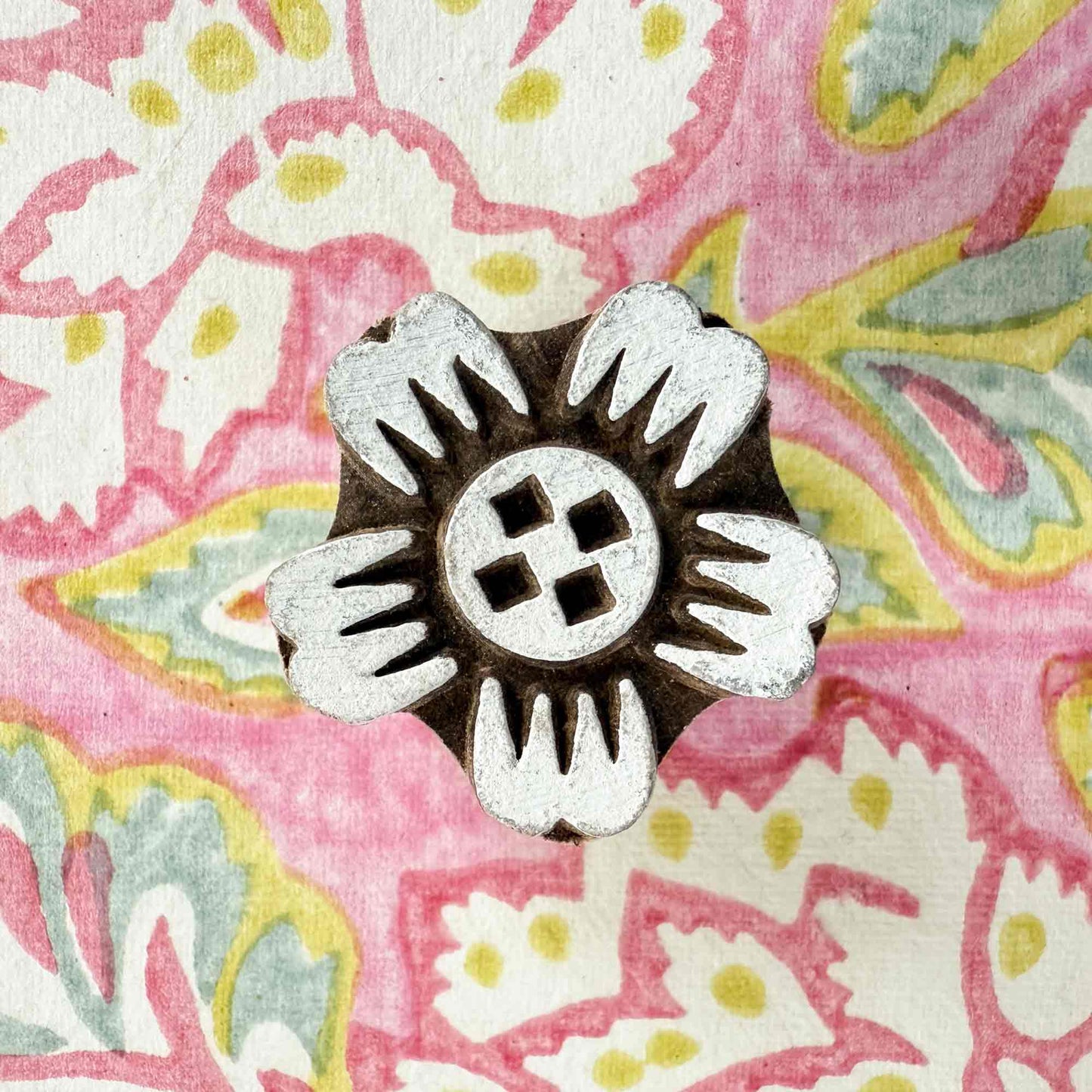 small flower design stamp for wood block stamping.