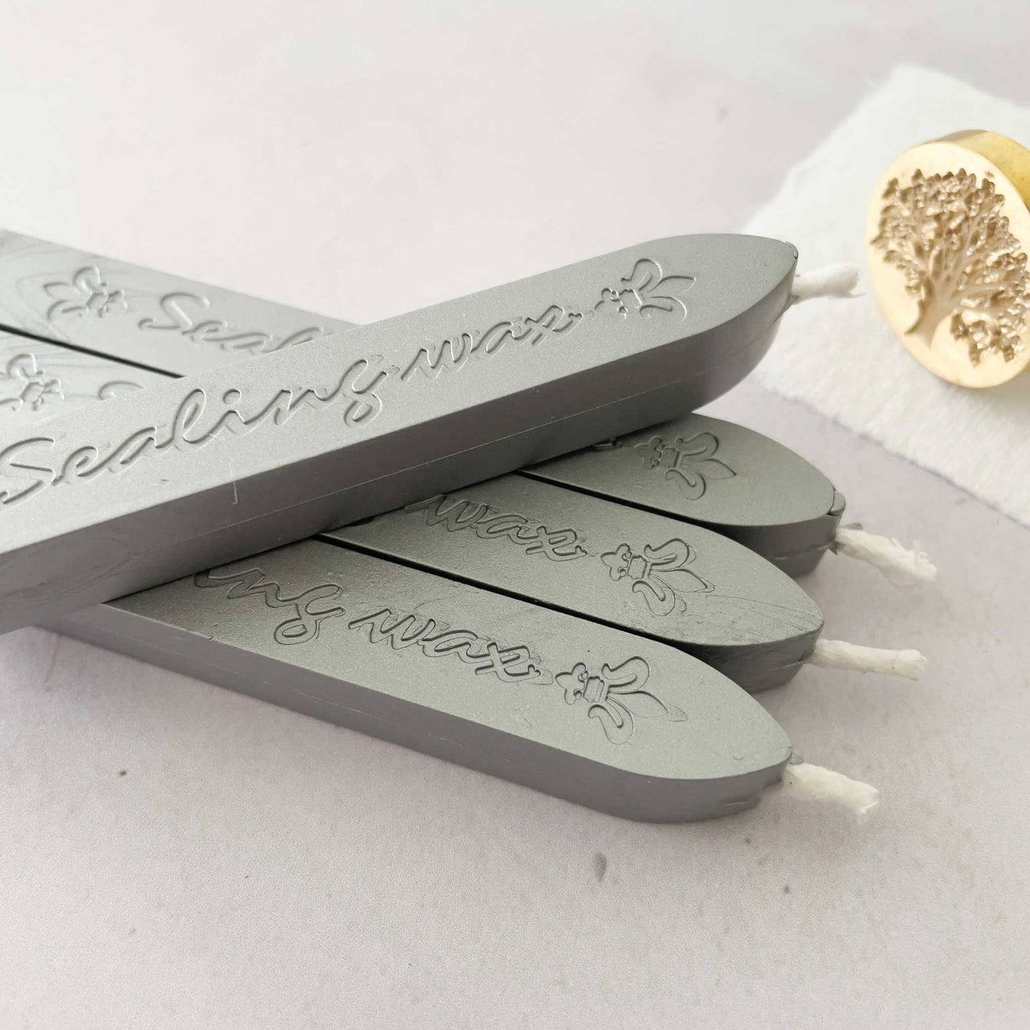 silver sealing wax sticks with wick