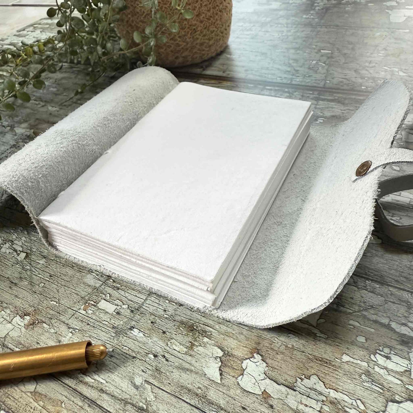 handmade leather notebook in ivory.