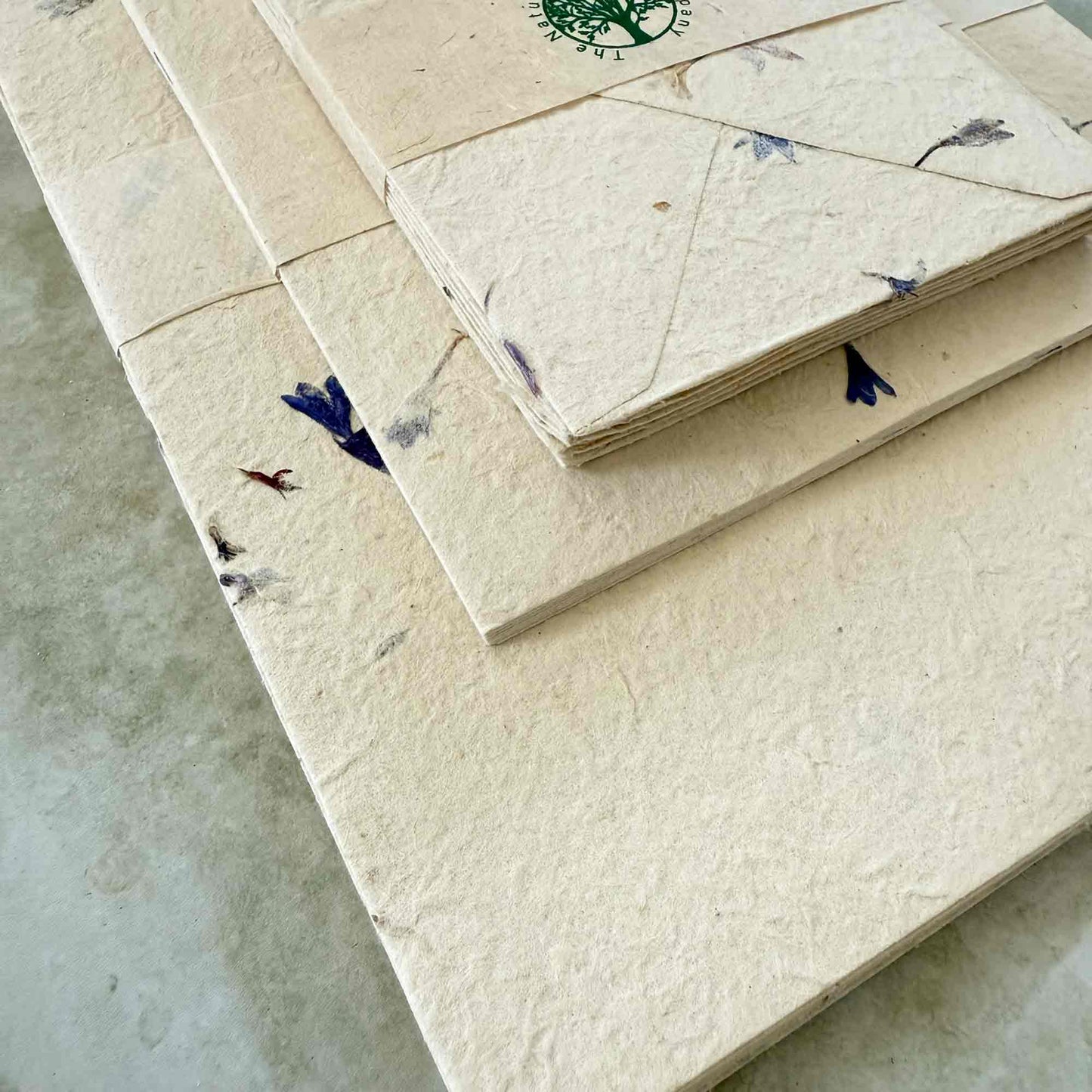 Nepalese handmade Lokta Paper. Sustainable paper and envelopes with dried flowers