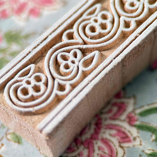 Wooden stamp with floral patterns for printing borders