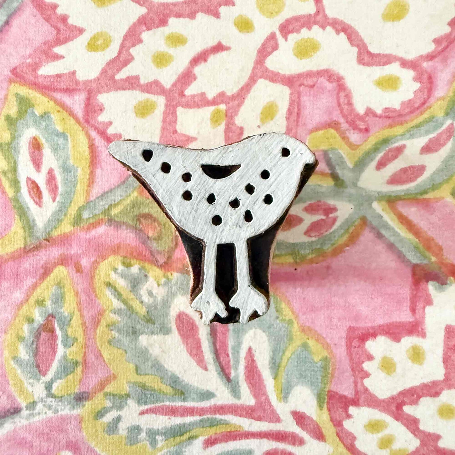 wood block stamp with cute bird pattern