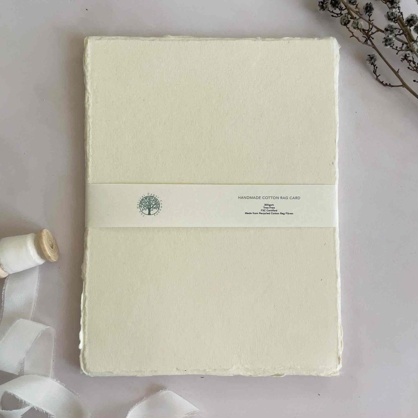 A4 handmade cotton rag paper with deckled edges. Cream handmade paper by The Natural Paper Company