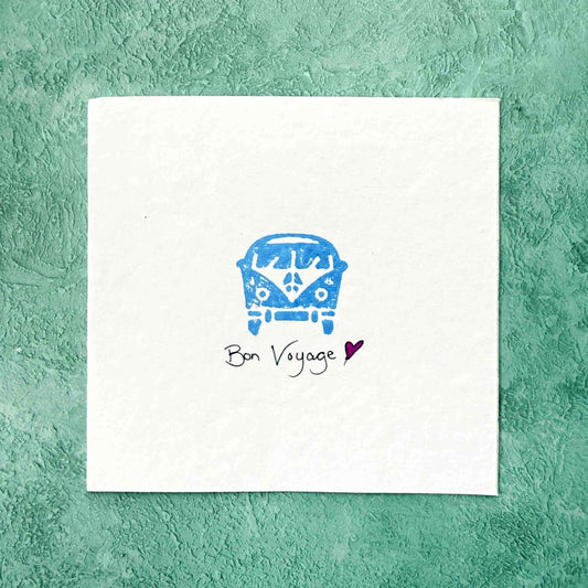 White card with blue vintage van illustration and 'Bon Voyage' text on a teal background