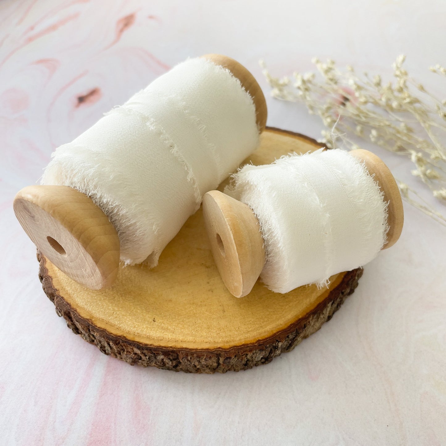 White Silk Ribbon for Crafts, Floristry and Wedding Stationery. Habotai silk ribbon with a frayed edge. By The Natural Paper Company