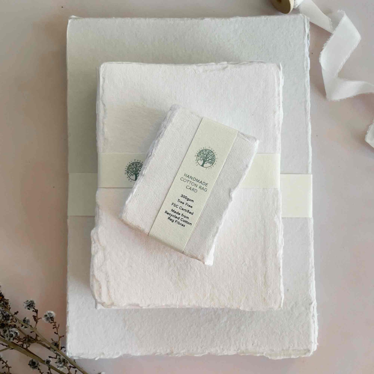 White handmade cotton rag paper, card and envelopes with deckled edges. Tree free paper by The Natural Paper Company