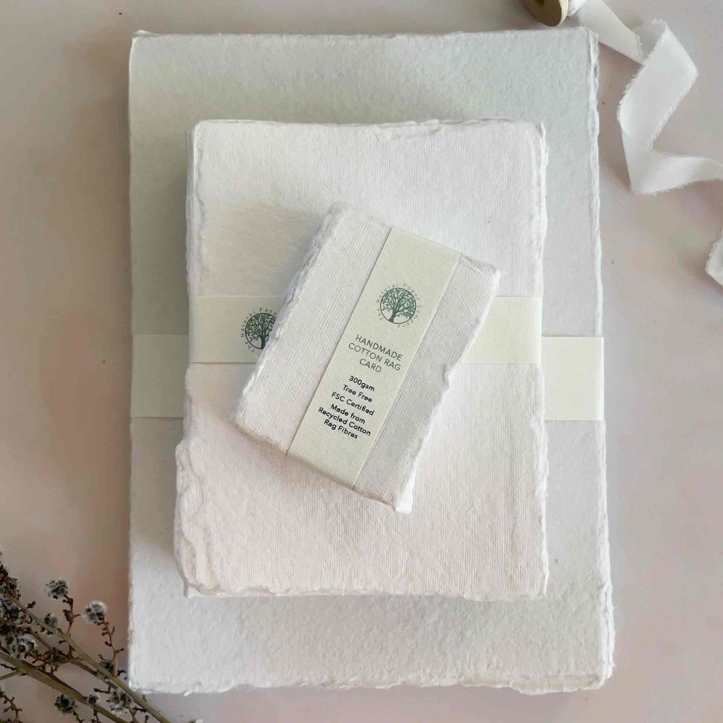 White handmade cotton rag paper, card and envelopes with deckled edges. Tree free paper by The Natural Paper Company