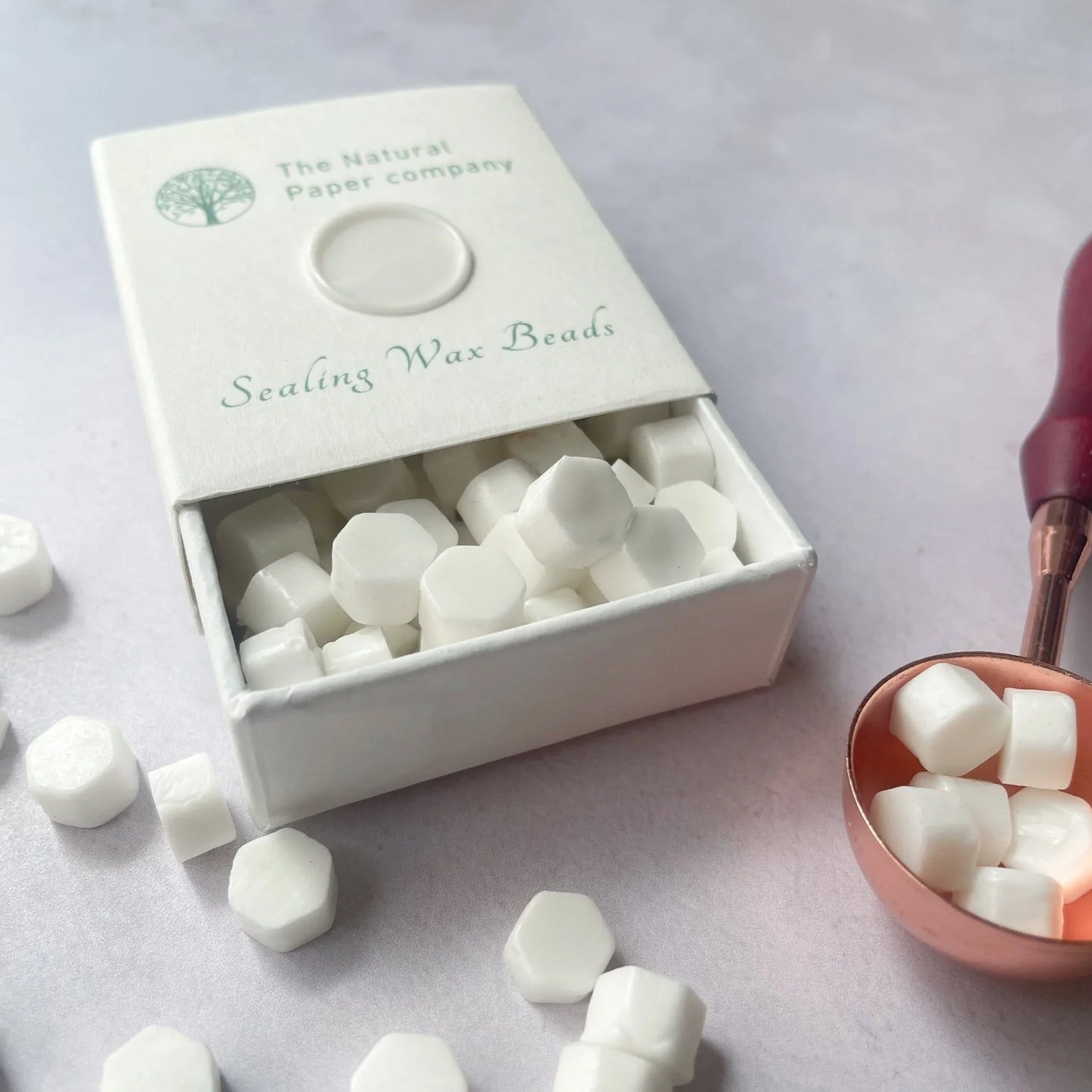 Eco friendly sealing wax beads in white. Plastic free, paraffin free and biodegradable wax for making wax seals. By The Natural paper Company