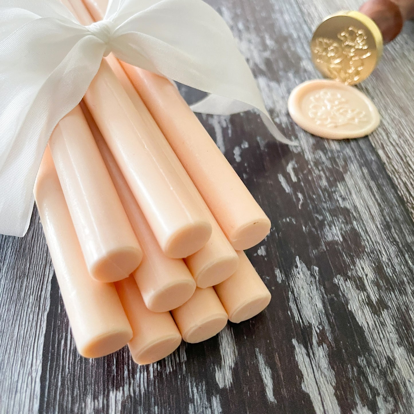 Eco friendly peach sealing wax sticks.  11mm wax seal sticks to use in a glue gun or melting spoon.  Perfect wax to make eco friendly wax seals.  By The Natural Paper Company