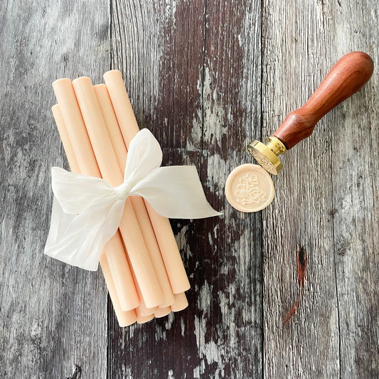 cream-colored sealing wax sticks