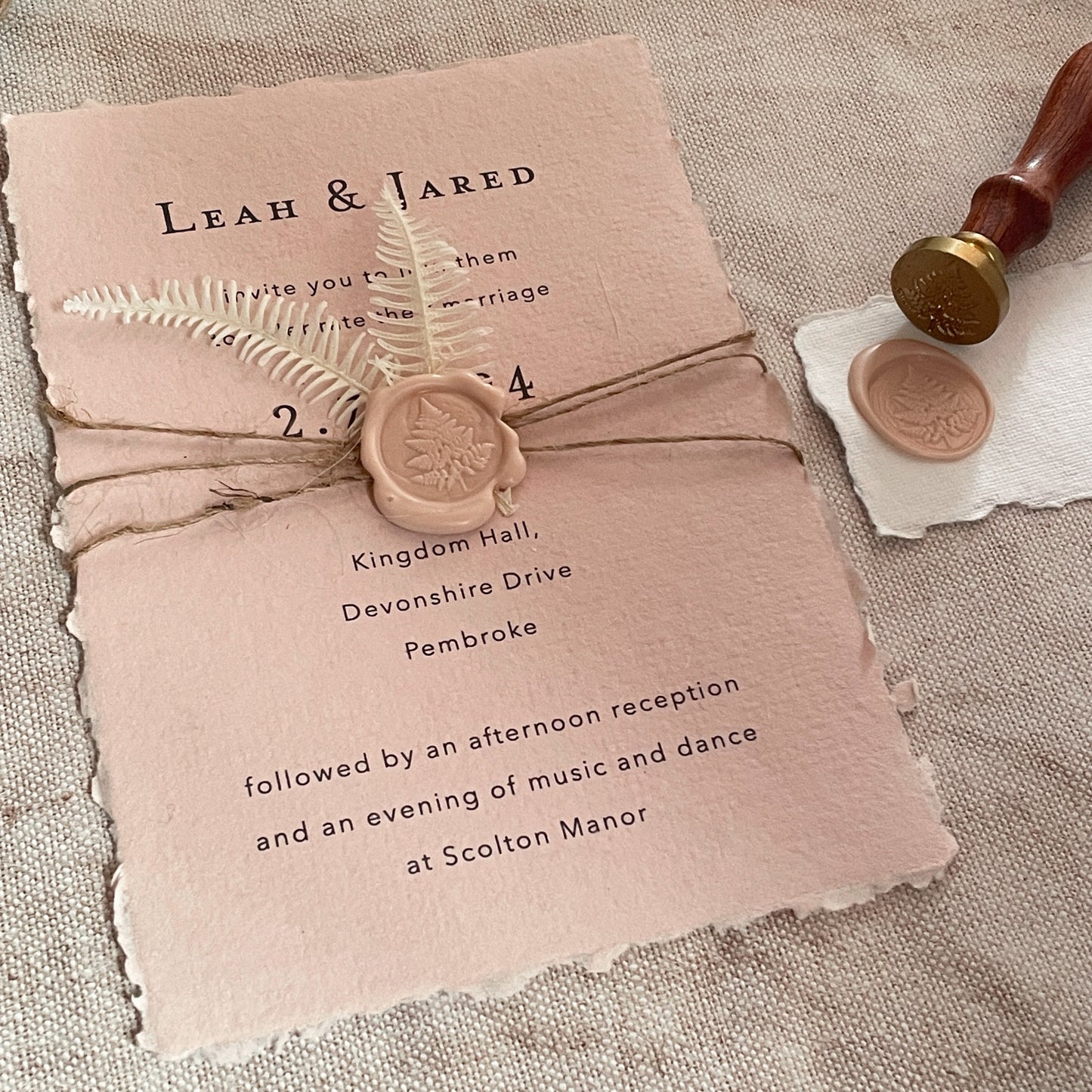 Easy DIY wedding invitation made from handmade paper, a fern leaf wax seal and jute string. Eco friendly wedding invitations. By The Natural Paper Company